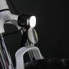 Fork mount e-bike light with reflector